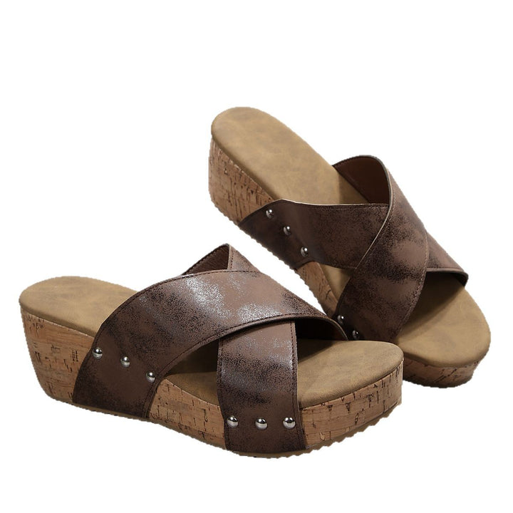 Women’s wedge sandals with heel strap, ergonomic footbed, cork look platform, and padded toe area Mune Fashion