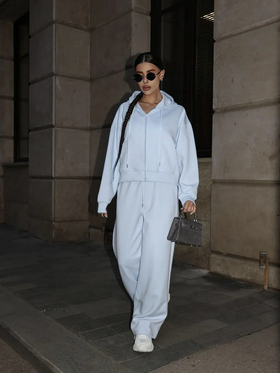 Women's loose high-waist lounge pants made of sweatshirt fabric with drawstring and side pockets Mune Fashion