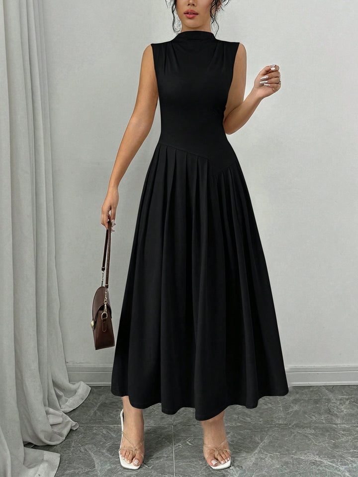 Women's sleeveless maxi dress with high standing collar, fitted bodice, and pleated skirt Mune Fashion