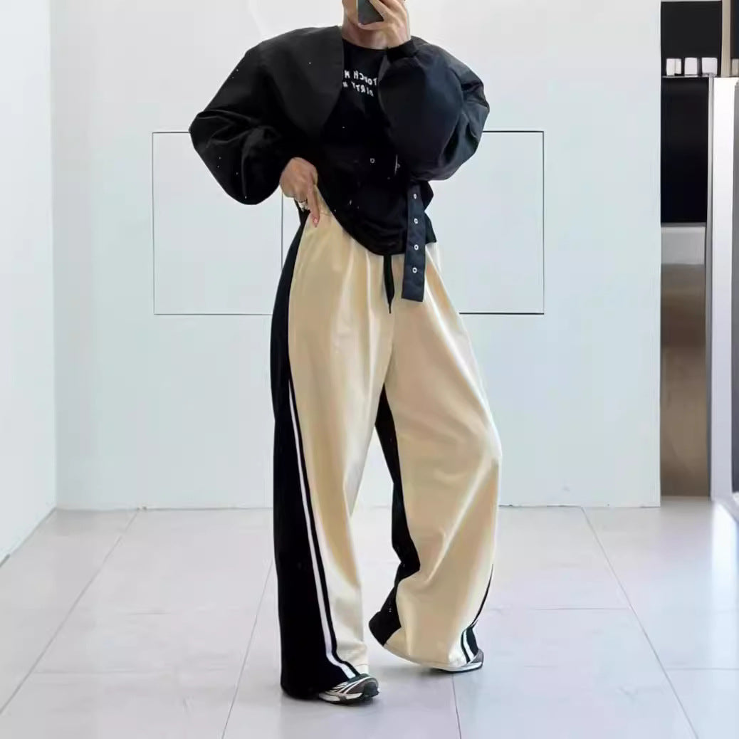 Men's wide trackpants with contrasting side panels, high waistband, and striking side stripe Mune Fashion