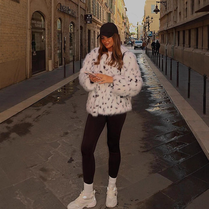 Ladies short-cut cozy faux fur blouson with Dalmatian look and concealed snap button placket Mune Fashion