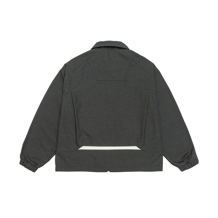 Unisex short jacket in boxy cut with shirt collar, visible metal zipper and utility patch pockets Mune Fashion