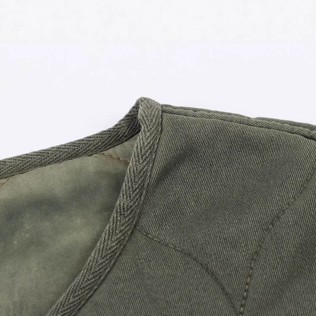 Women's short quilted jacket with round neck, two-way zipper and button placket Mune Fashion