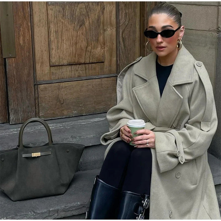 Women's extravagant oversized coat in maxi length made of wool blend with accentuated shoulder yoke and wide lapels Mune Fashion