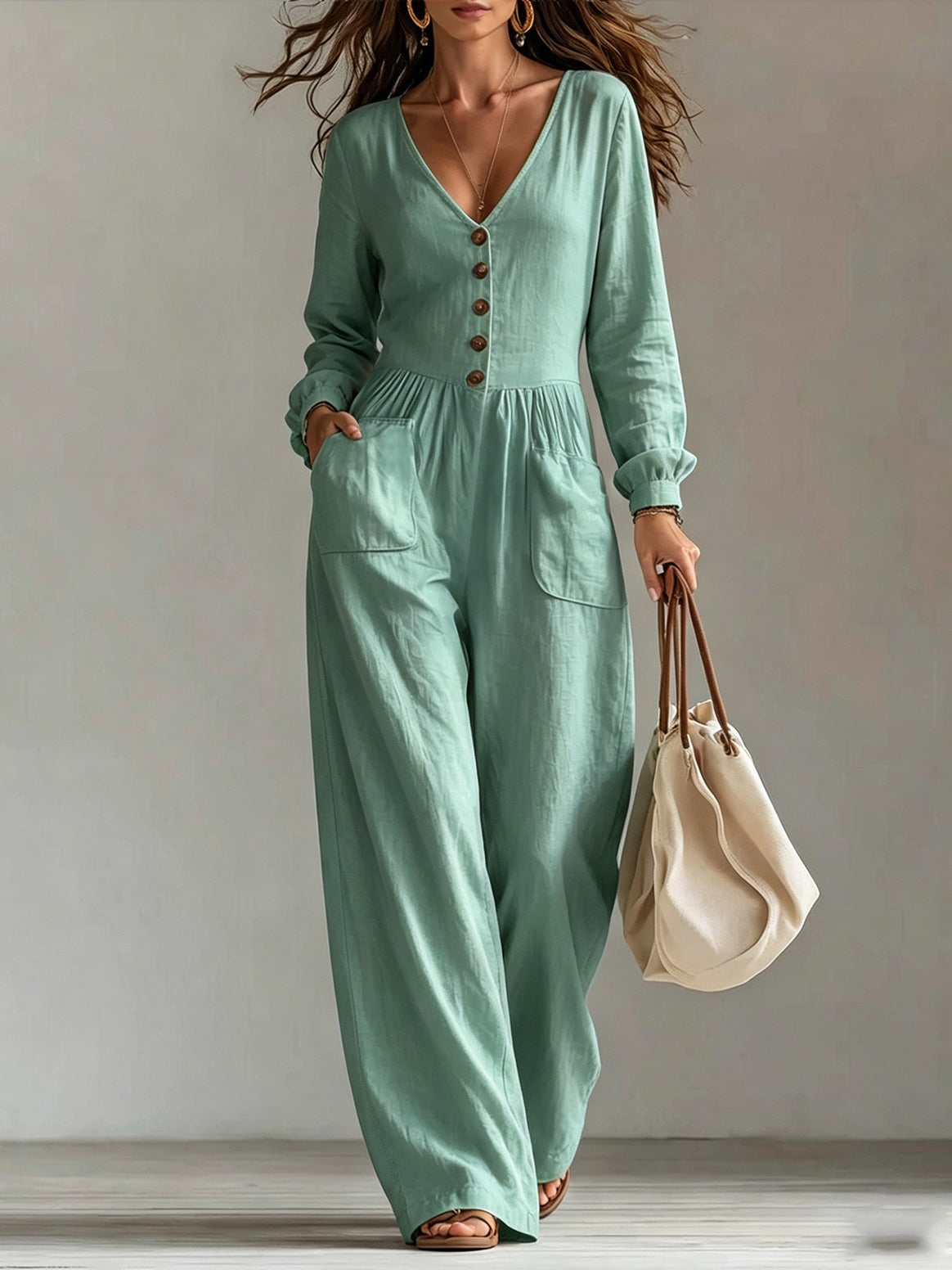 Ladies linen jumpsuit with V-neck, button placket and wide leg cut Mune Fashion