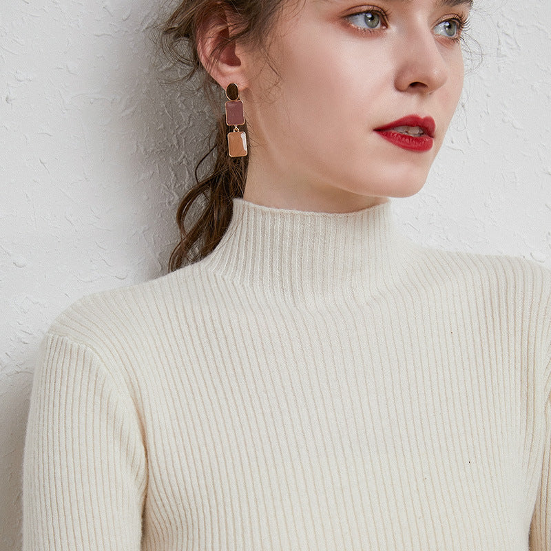 Women’s figure-hugging fine-knit turtleneck sweater with extra-fine ribbed texture and cashmere-soft feel Mune Fashion