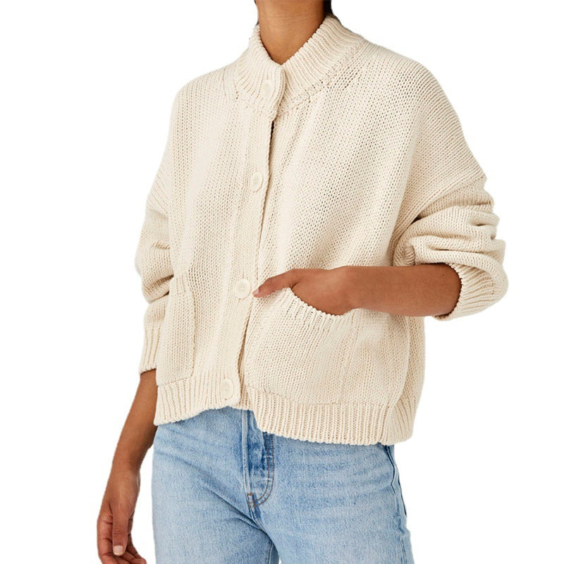 Women's Short Boxy Cardigan made of chunky knit with high button placket and side pockets Mune Fashion