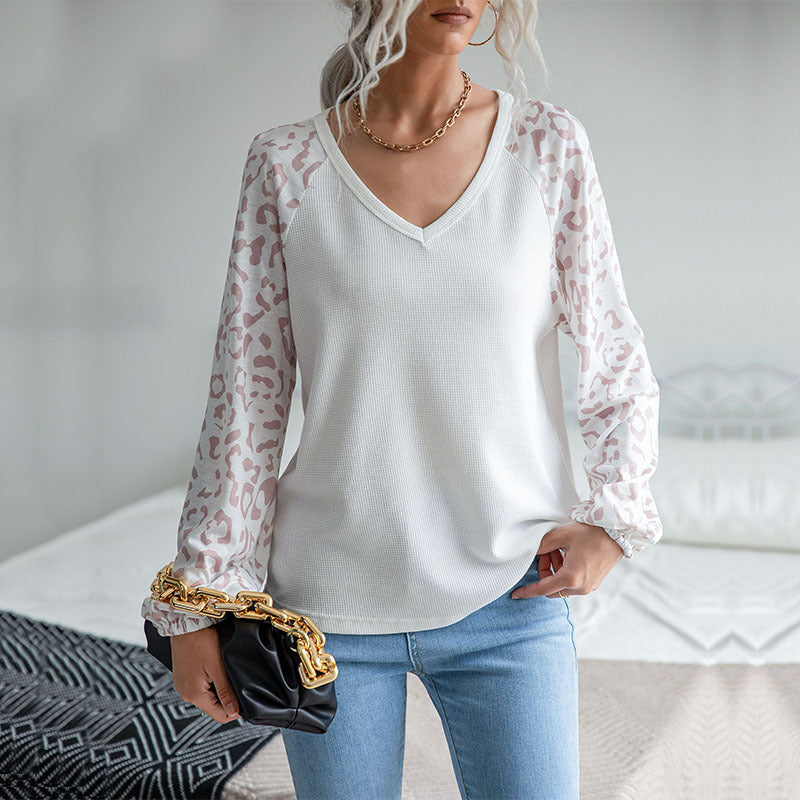 Ladies V-neck waffle knit top with transparent net sleeves in leopard print Mune Fashion