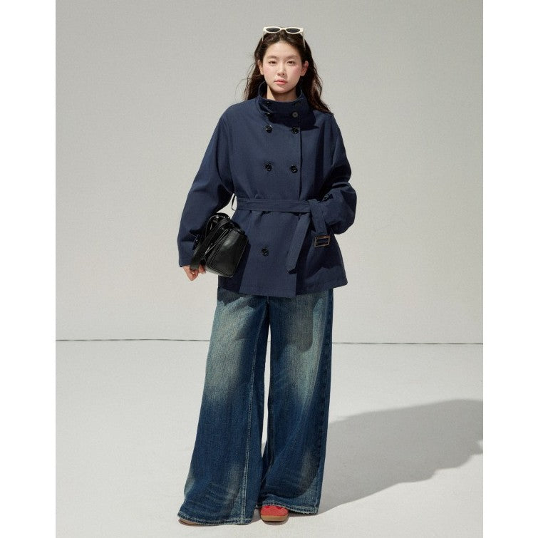 Ladies short trench coat with a flattering belt and double-breasted button placket Mune Fashion