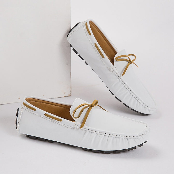 Men's suede moccasins with soft plush lining, decorative tassel, and textured rubber outsole Mune Fashion
