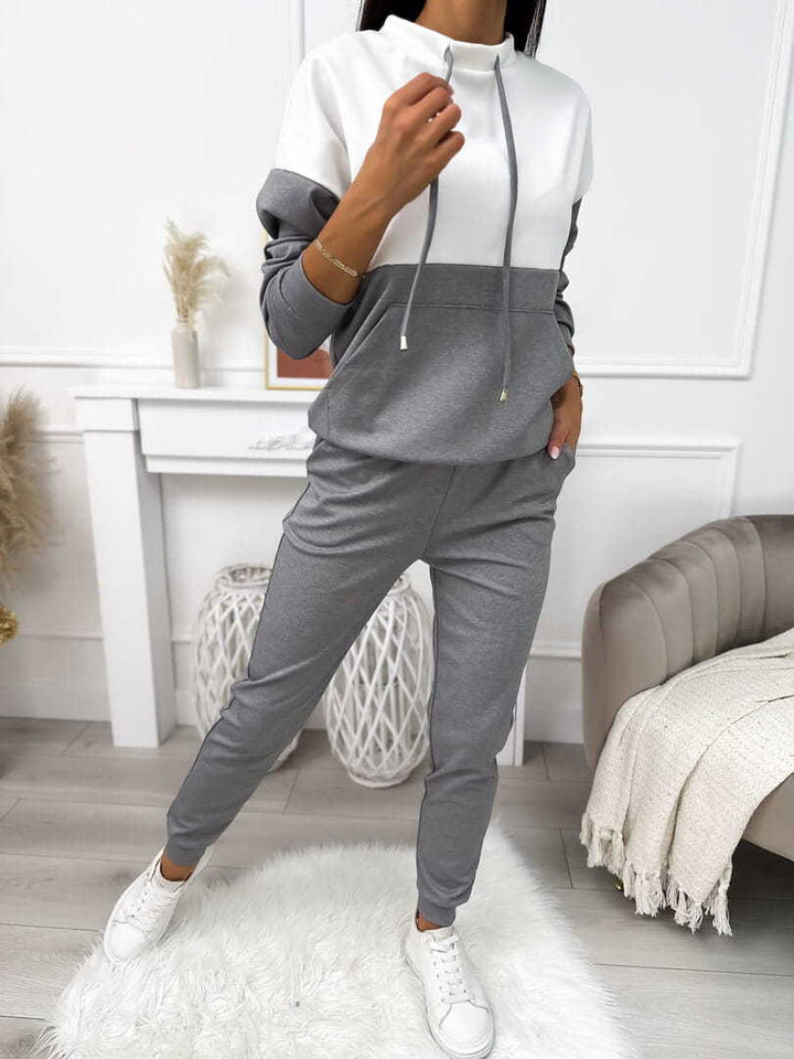 Women's two-piece loungewear set with stand-up collar, kangaroo pocket, and slim joggers Mune Fashion