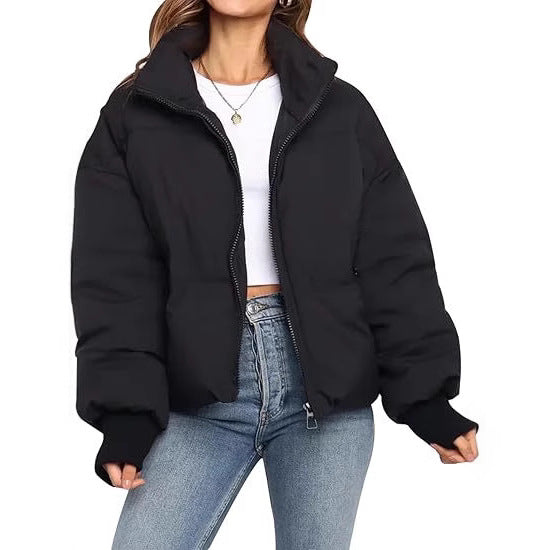 Women short cut quilted winter jacket with stand-up collar, zipper and ribbed cuffs Mune Fashion