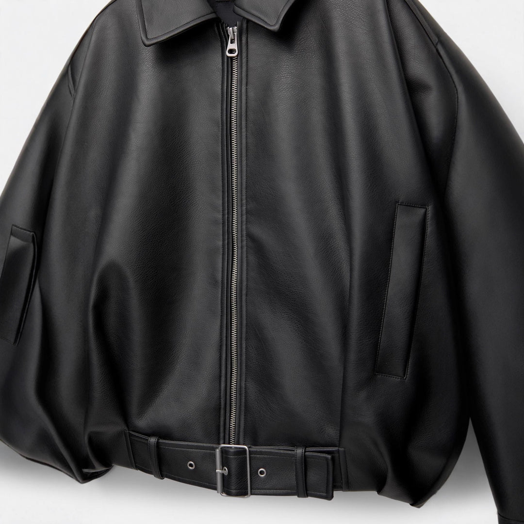 Women's short cut faux leather jacket with full zipper and figure-hugging belt Mune Fashion