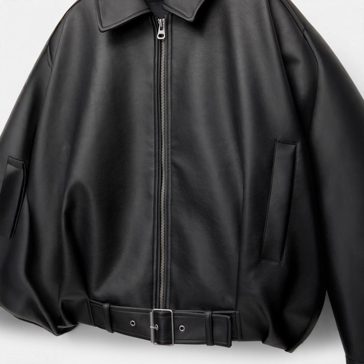 Women's short cut faux leather jacket with full zipper and figure-hugging belt Mune Fashion