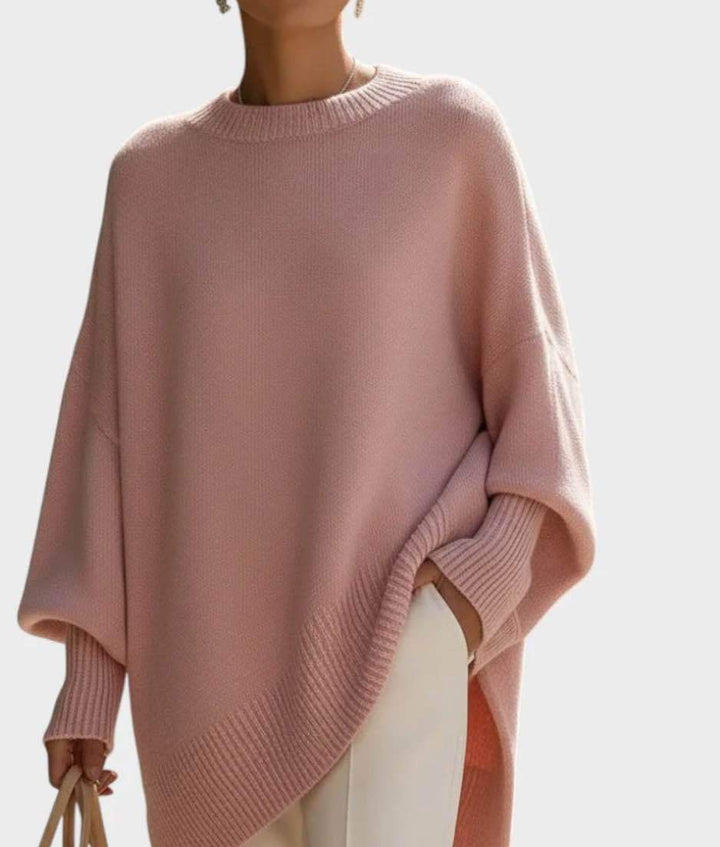 Women's oversized knit poncho with asymmetrical hem and ribbed sleeves Mune Fashion