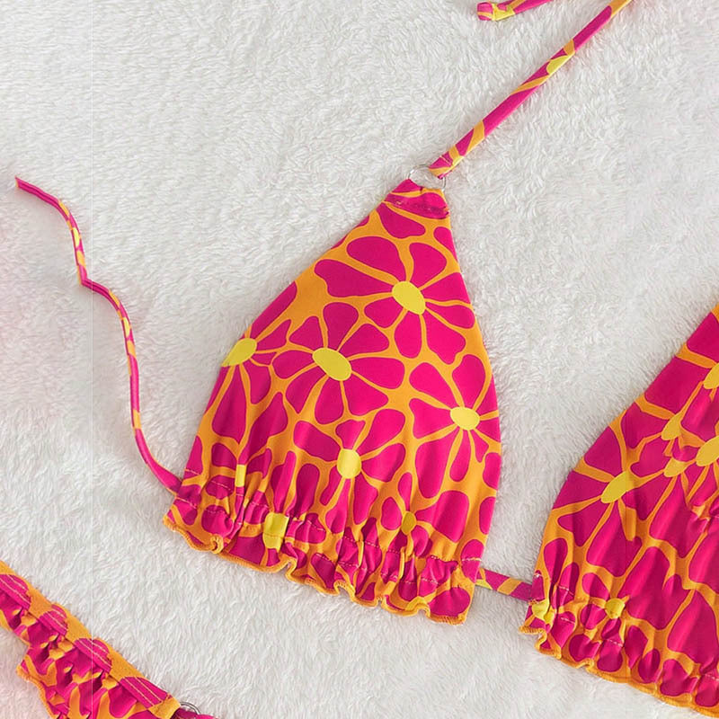 Ladies triangle bikini with playful flower design Mune Fashion
