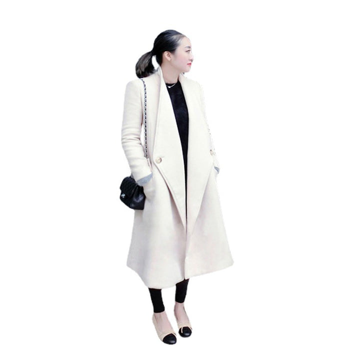 Women's midi-length tailored wool blend long coat with shawl collar, inset pockets, and discreet decorative buttons Mune Fashion