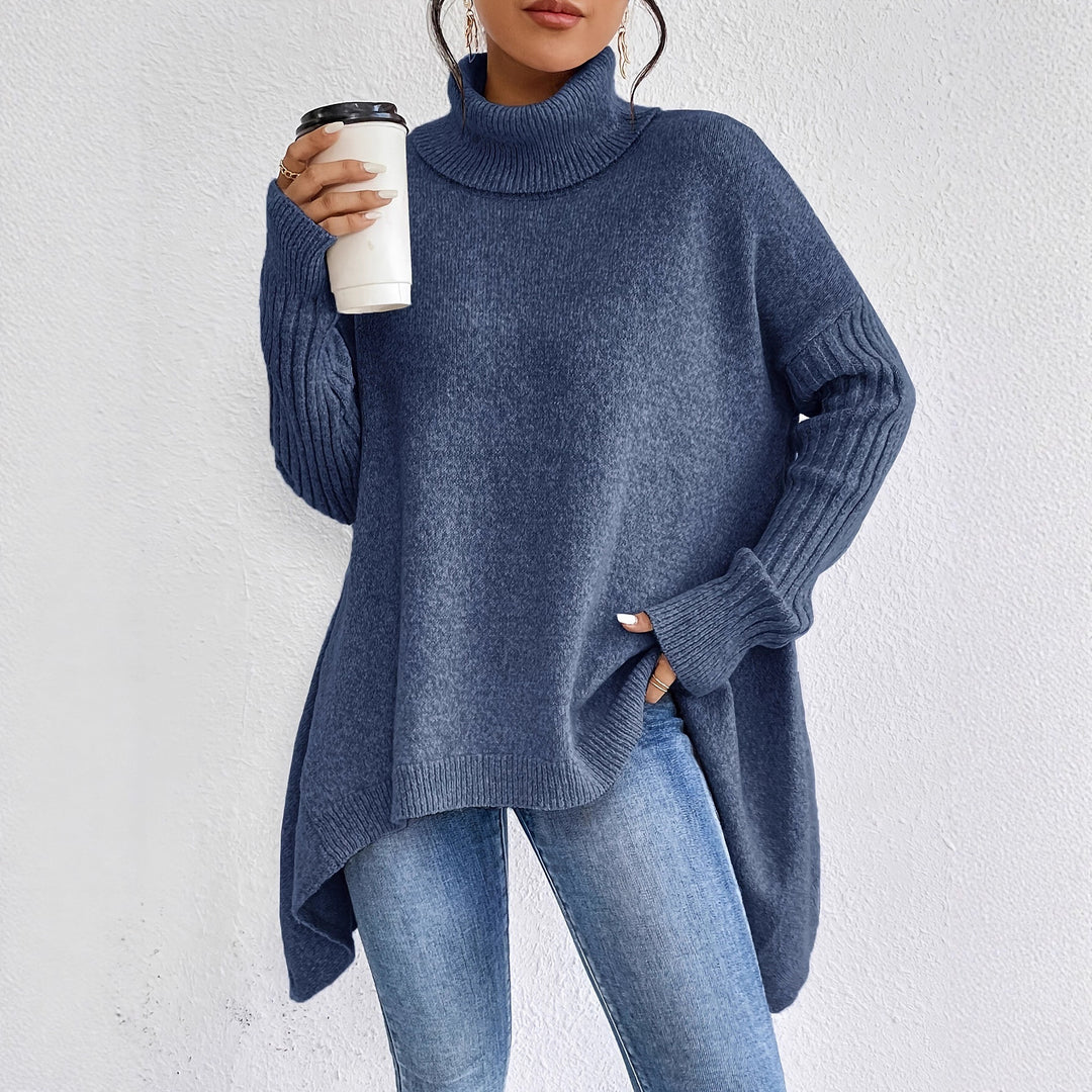 Women's oversized knit sweater with high turtleneck, ribbed sleeves, and asymmetric hem Mune Fashion