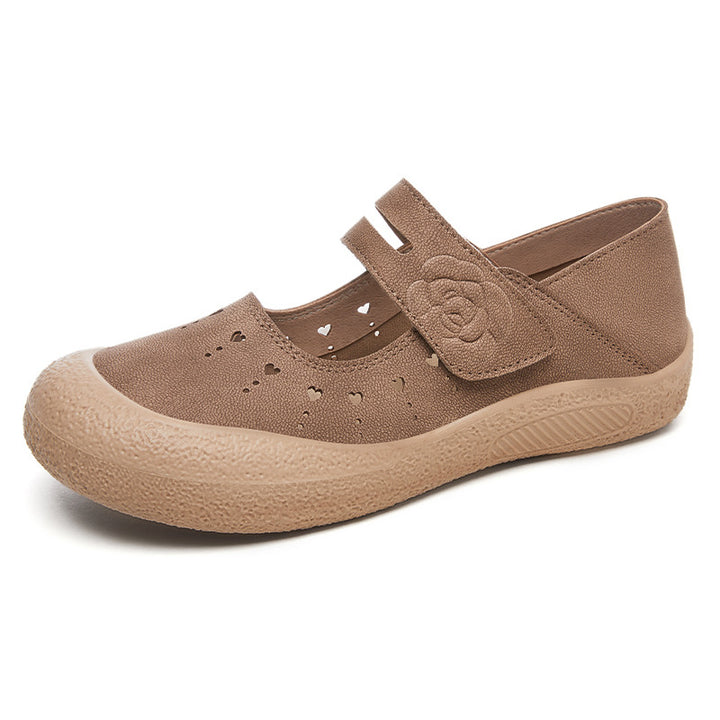 Women’s comfortable Mary-Jane slipper with Velcro closure, perforated heart pattern and shock-absorbing lightweight sole Mune Fashion