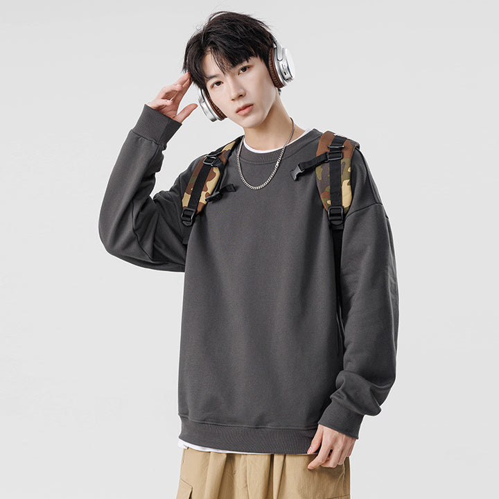 Unisex Oversize Crew Neck Sweatshirt made from heavy cotton blend with ribbed hem and raglan sleeves Drune
