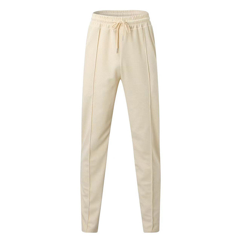 Men's patterned jogging pants with elastic drawstring, shaping crease, and tapered leg Mune Fashion