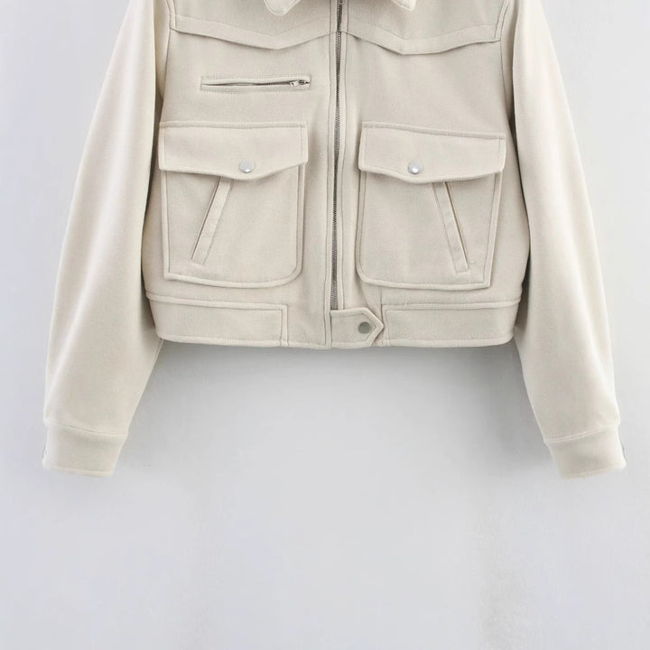 Women's cropped field blazer with shoulder epaulettes, large flap pockets, and central zipper Mune Fashion
