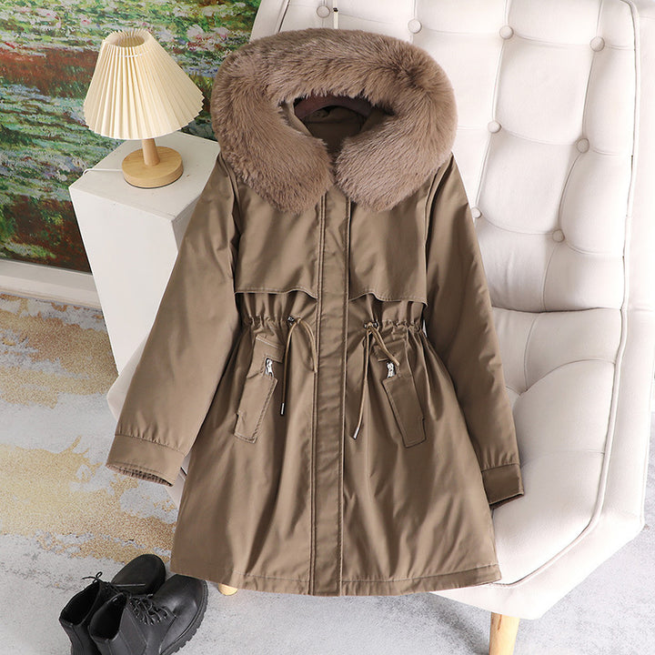 Women's mid-length water-repellent parka with voluminous faux fur collar, waistband drawstring, and multifunctional flap pockets Mune Fashion