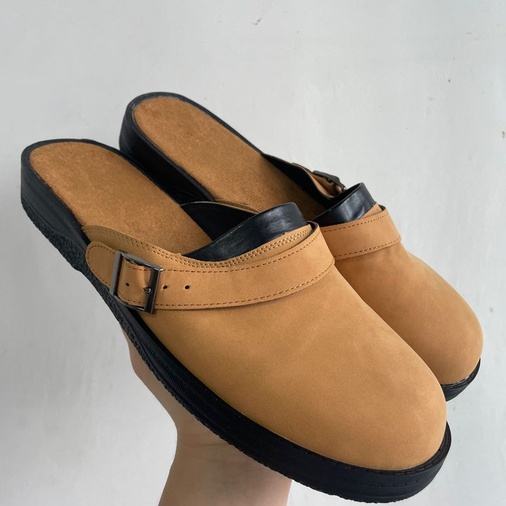 Women's faux leather slide with adjustable buckle strap and cushioned comfort footbed Mune Fashion
