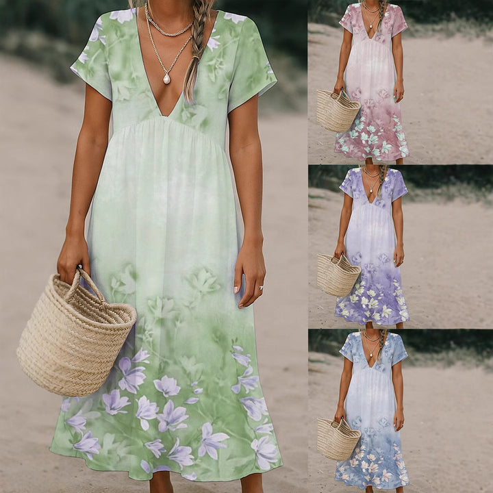 Ladies max dress with deep V-neck and flowing skirt Mune Fashion