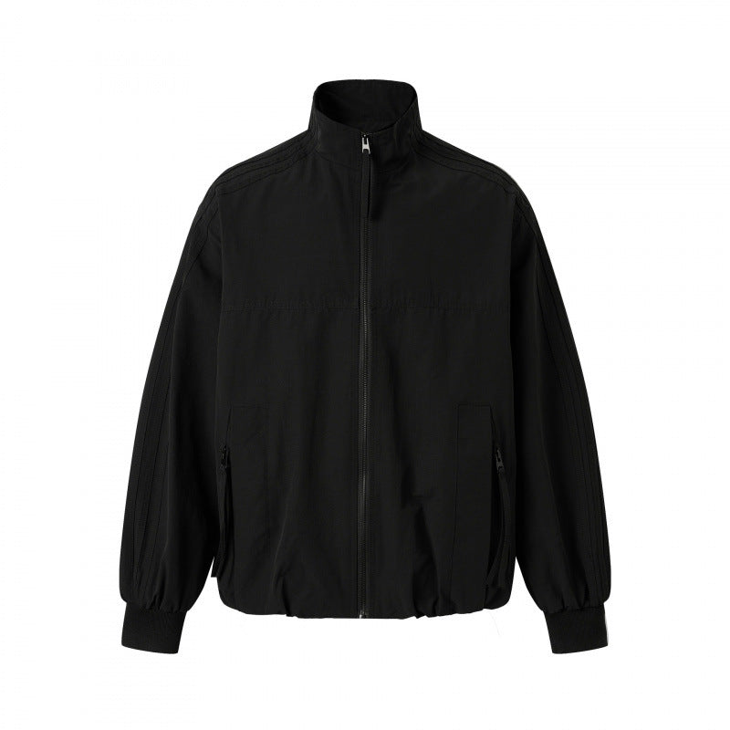 Unisex Lightweight Boxy Outdoor Jacket in Track Style with High Stand-Up Collar, Zipper Pockets and Elastic Hem Mune Fashion