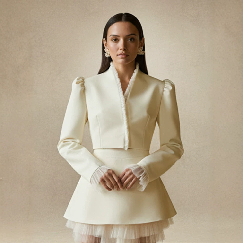 Ladies short blazer with tailored cropped silhouette, gathered shoulders and delicate tulle cuffs Mune Fashion