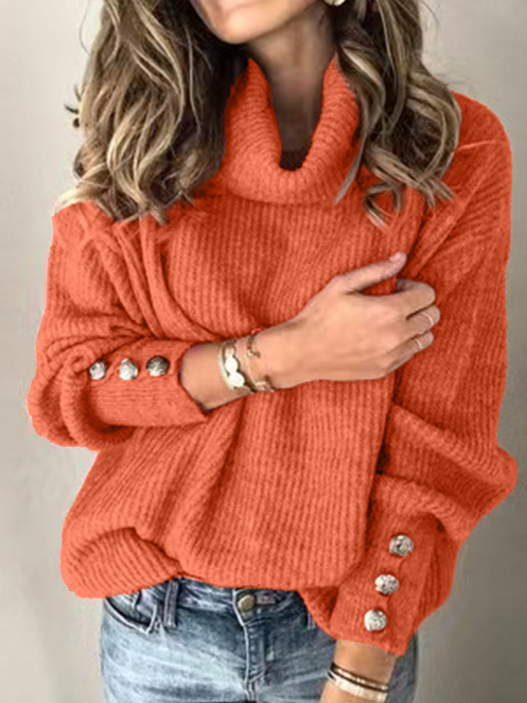 Women's chunky knit turtleneck sweater with decorative button sleeves and relaxed oversized fit Mune Fashion