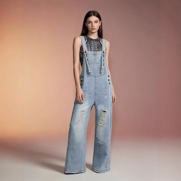 Women's modern baggy overalls made of pigment-dyed stretch denim with adjustable straps and visible rips Mune Fashion
