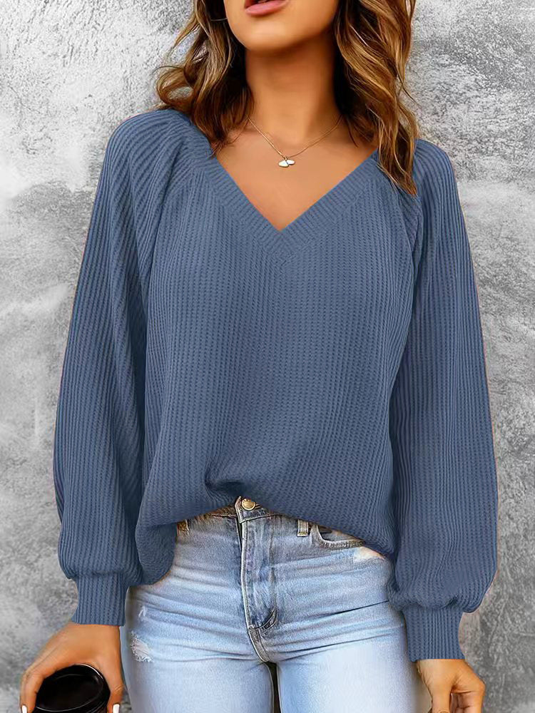 Women's fine structure knit sweater with V-neck, balloon sleeves, and ribbed cuffs Mune Fashion