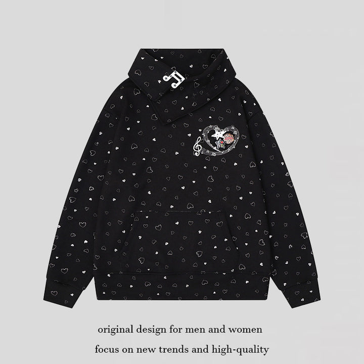 Women’s oversized sweatshirt with asymmetrical stand-up collar, kangaroo pocket and musical heart embroidery Mune Fashion