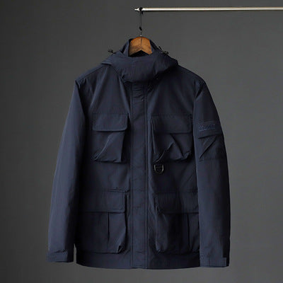 Men's urban field jacket with multiple pockets, wind-resistant surface and concealed hood Mune Fashion
