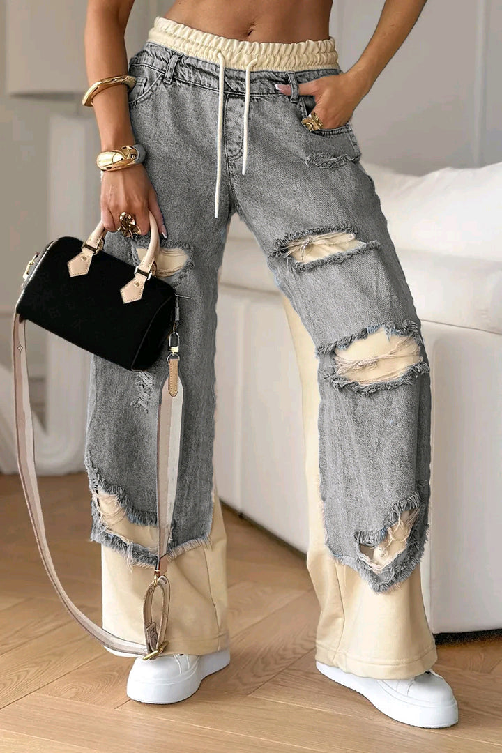 Women's loose patchwork jeans with elastic drawstring waistband, destroyed look and contrasting sweat inserts Mune Fashion