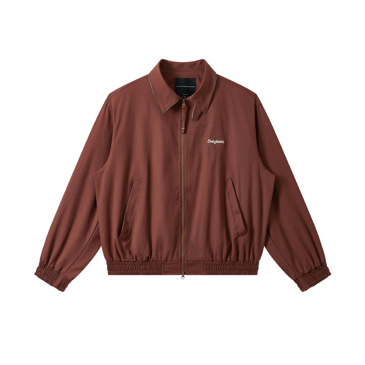 Men's short cut boxy blouson with high stand-up collar, elastic hem and zipper front.