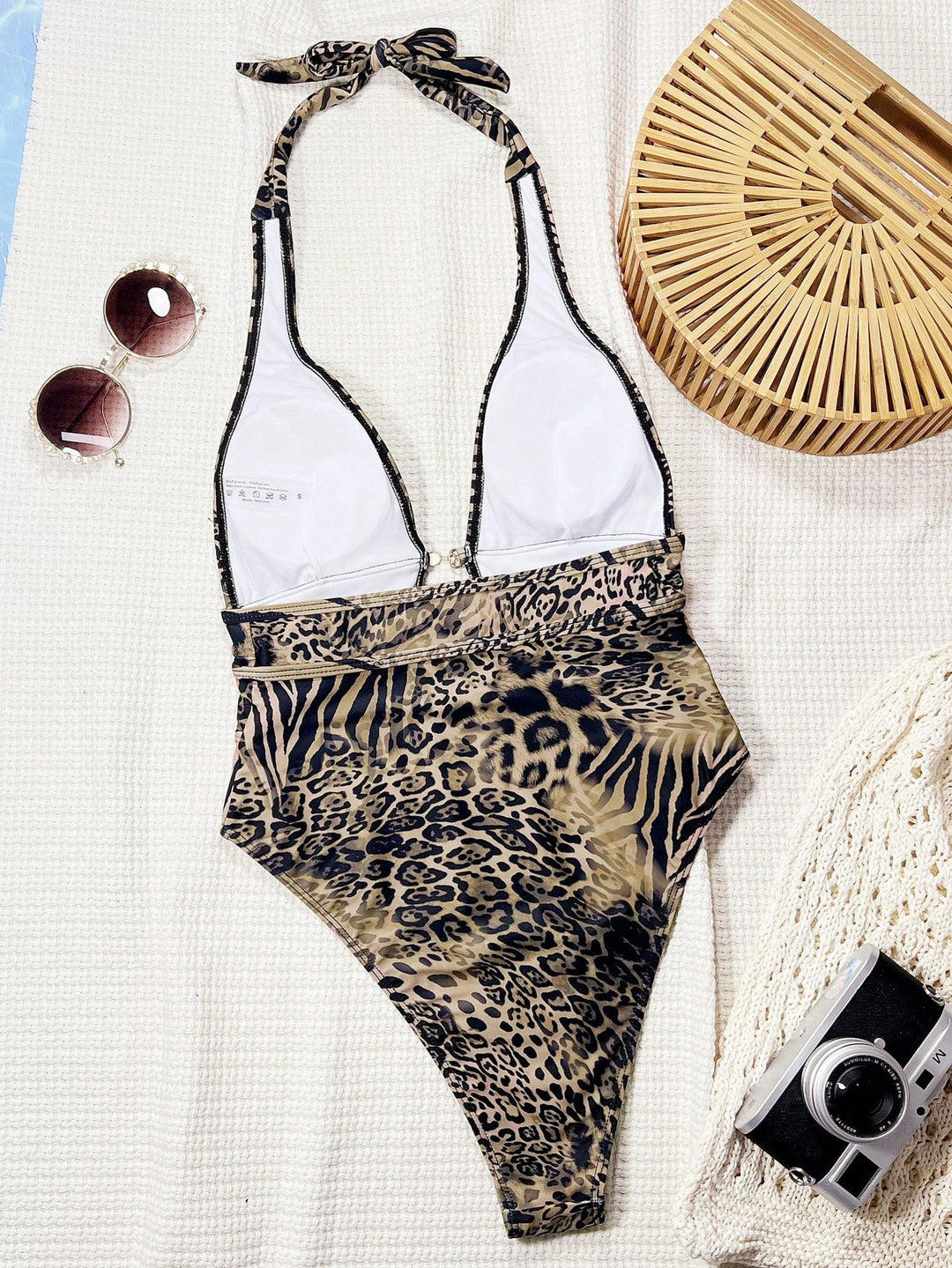 Ladies Designer Swimsuit with Deep V-Neck and Straps Mune Fashion