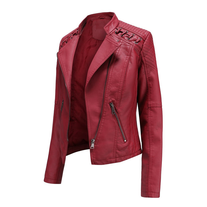 Ladies tailored faux leather biker jacket with quilted shoulder section, asymmetrical zipper and decorative eyelets Mune Fashion