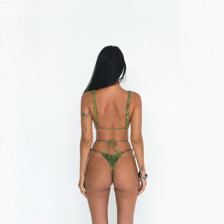 Ladies high-cut one-piece swimsuit with deep V-neck and side tie straps Mune Fashion