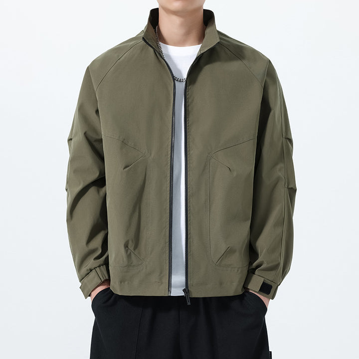 Men's Lightweight Utility Transitional Jacket with Stand Collar, Raglan Sleeves, and Adjustable Velcro Cuffs Mune Fashion