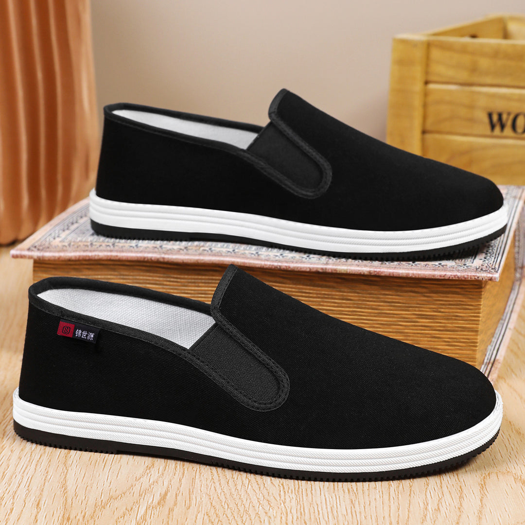 Men's lightweight canvas slip-on casual shoe with elastic entry, padded insole, and grippy rubber outsole Mune Fashion