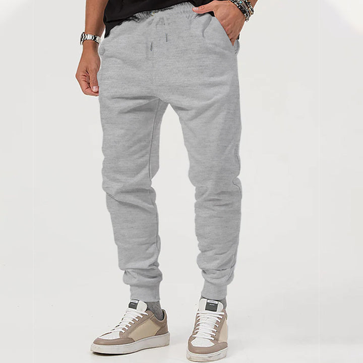 Men's Urban Jogging Trousers with Low Crotch, Elastic Drawstring Waistband, and Ribbed Cuffs Mune Fashion