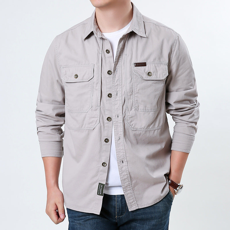 Men's casual utility shirt jacket made of cotton twill with two patch breast pockets and buttonable front.