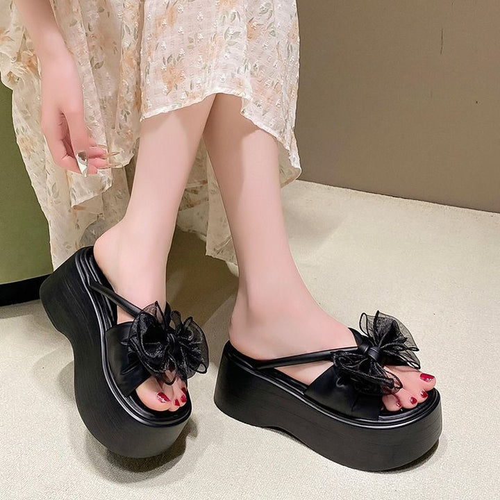 Women's platform slide sandal with high wedge sole and organza flower appliqué Mune Fashion