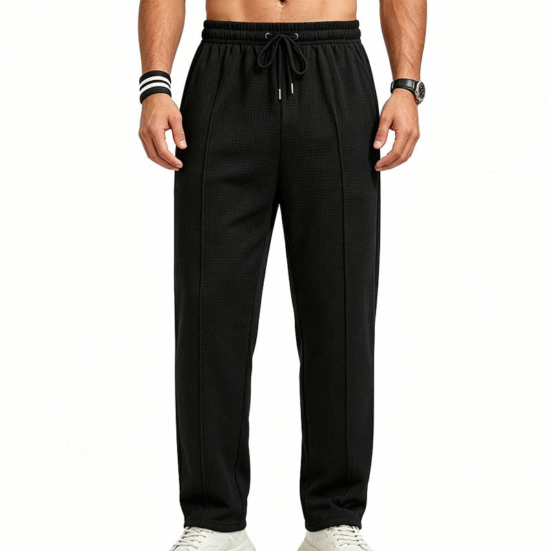 Men's straight-cut relaxed trousers with decorative center seam, elasticated drawstring waistband and side pockets Mune Fashion