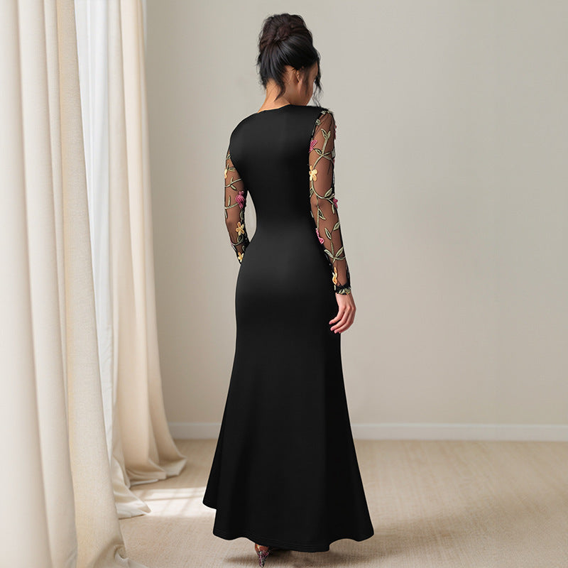 Women's evening dress with embroidered mesh sleeves, asymmetrical drape and waist sash Mune Fashion