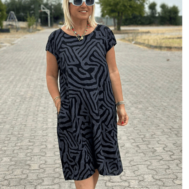 Women knee-length A-line midi dress with textured jacquard look and round neckline Mune Fashion