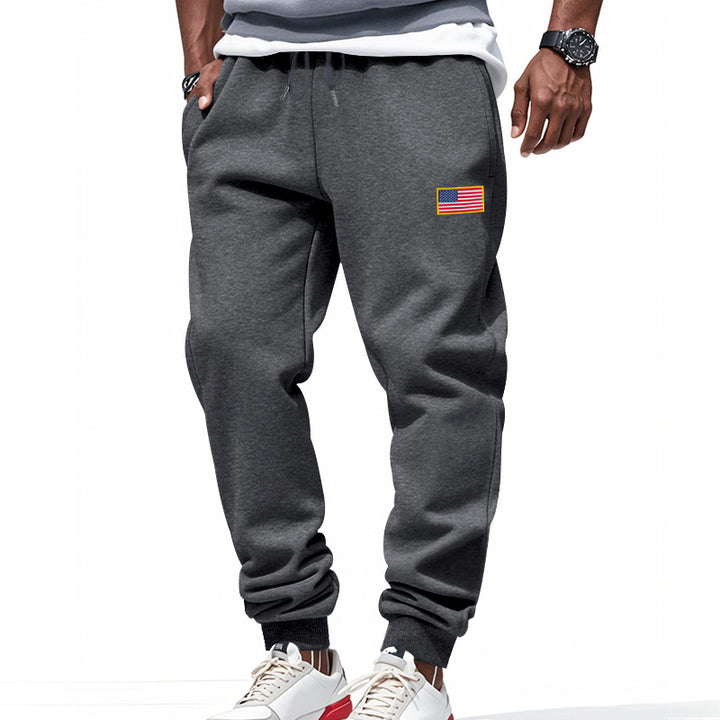 Men's slim-fit sweatpants with tapered leg, elastic drawstring waistband, and discreet flag application Mune Fashion